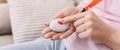 Senior woman hand pressing Alarm Button, closeup Royalty Free Stock Photo