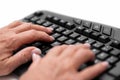 Senior woman hands are correctly touch typing on the keyboard