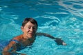 Senior woman happy in the swimming pool