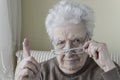 Senior woman with her finger up for admonition / warning Royalty Free Stock Photo