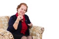 Senior Woman at her Seat Inviting to Have a Tea