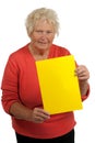 Senior woman holding a blank board