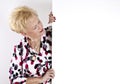 Senior woman holding blank white sign Royalty Free Stock Photo