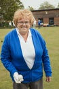 Senior Woman Holding a Bocce Ball