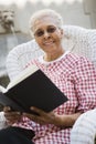 Senior Woman Holding Book Royalty Free Stock Photo