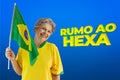 Senior Woman Holding Brazil Flag on Cinematic Background Written Towards Hex in Portuguese