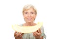 Senior woman holding cantaloupe