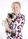 Senior woman holding cat Royalty Free Stock Photo