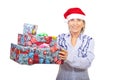 Senior woman holding Christmas gifts Royalty Free Stock Photo