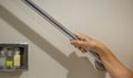 Senior woman holding on handrail for safety in bathroom Royalty Free Stock Photo