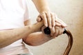 Close up of mature womans & nurse hands. Health care giving, nursing home. Parental love of grandmother. Old age related diseases. Royalty Free Stock Photo