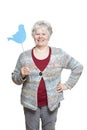 Senior woman holding a social media sign smiling Royalty Free Stock Photo