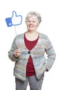 Senior woman holding a social media sign smiling Royalty Free Stock Photo