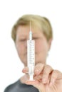 Senior woman holding syringe Royalty Free Stock Photo