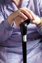 Senior Woman Holding Walking Stick