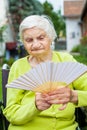 Overheated elderly woman Royalty Free Stock Photo