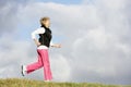 Senior Woman Jogging In Park