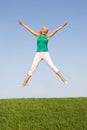 Senior woman jumping in air Royalty Free Stock Photo