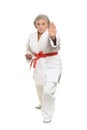 Senior woman in karate pose