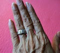 A senior woman left hand, showing her wedding ring Royalty Free Stock Photo