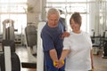 Senior woman lifting dumbbell at gym Royalty Free Stock Photo