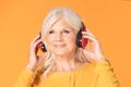 Senior woman listening to music Royalty Free Stock Photo