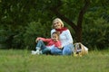 Senior woman with little girl in park Royalty Free Stock Photo