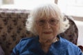 Senior woman looking at camera in nursing home Royalty Free Stock Photo