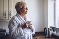 Senior Woman Looking out Window Royalty Free Stock Photo