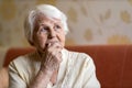 Senior woman lost in thought Royalty Free Stock Photo