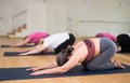 Active senior woman practicing yoga at group Royalty Free Stock Photo