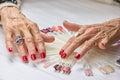 Senior woman manicured hands.