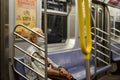 Senior Woman in New York City MTA Subway Train Wearing Face Mask NYC Royalty Free Stock Photo