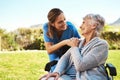 Senior woman, nurse and wheelchair in life insurance, healthcare support or garden at nursing home. Happy elderly female Royalty Free Stock Photo