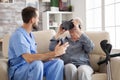 Senior woman in nursing amased while using vr glasses