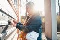 Senior woman opens the mailbox to check for new mails