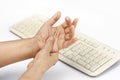 Senior woman painful finger cause use of keyboard Royalty Free Stock Photo