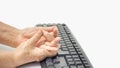 Senior woman painful finger due to prolonged use of keyboard Royalty Free Stock Photo