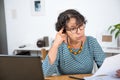 Senior woman paying bills with laptop at home Royalty Free Stock Photo