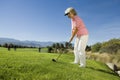 Senior Woman Playing Golf Royalty Free Stock Photo