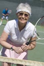 Senior Woman Playing Tennis Royalty Free Stock Photo