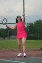 Senior woman playing tennis Royalty Free Stock Photo