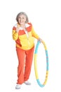 Senior woman posing with hoop and showing thumbs up Royalty Free Stock Photo