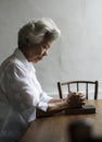 Senior woman prayer faith in christianity religion Royalty Free Stock Photo