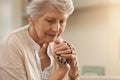 Senior woman praying Royalty Free Stock Photo