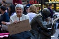 Senior woman with protest sign at Occupy Wall Street