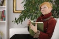 Senior woman reading a book Royalty Free Stock Photo