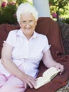 Senior woman reading book Royalty Free Stock Photo