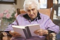 Senior woman reading book Royalty Free Stock Photo