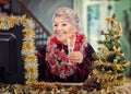 Senior woman receives Christmas greetings online